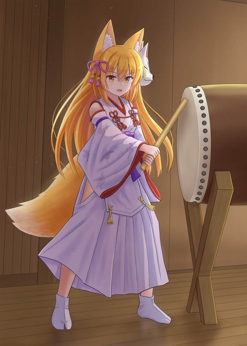 道場で太鼓を叩く狐娘